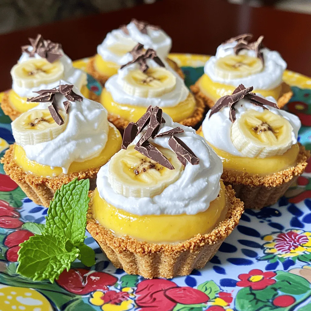 To create mini banana cream pies, you need a few key ingredients. First, grab a pre-made graham cracker pie crust. This crust gives a sweet and crunchy base. You will also need ripe bananas. Their natural sweetness shines through in every bite.